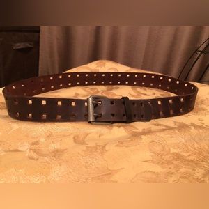 Brown leather belt measures 39” in length